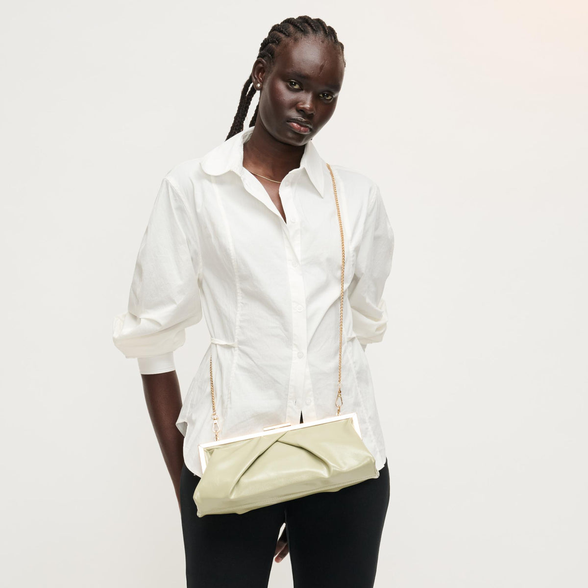 Woman wearing Sage Urban Expressions Scottie Crossbody 840504207983 View 2 | Sage