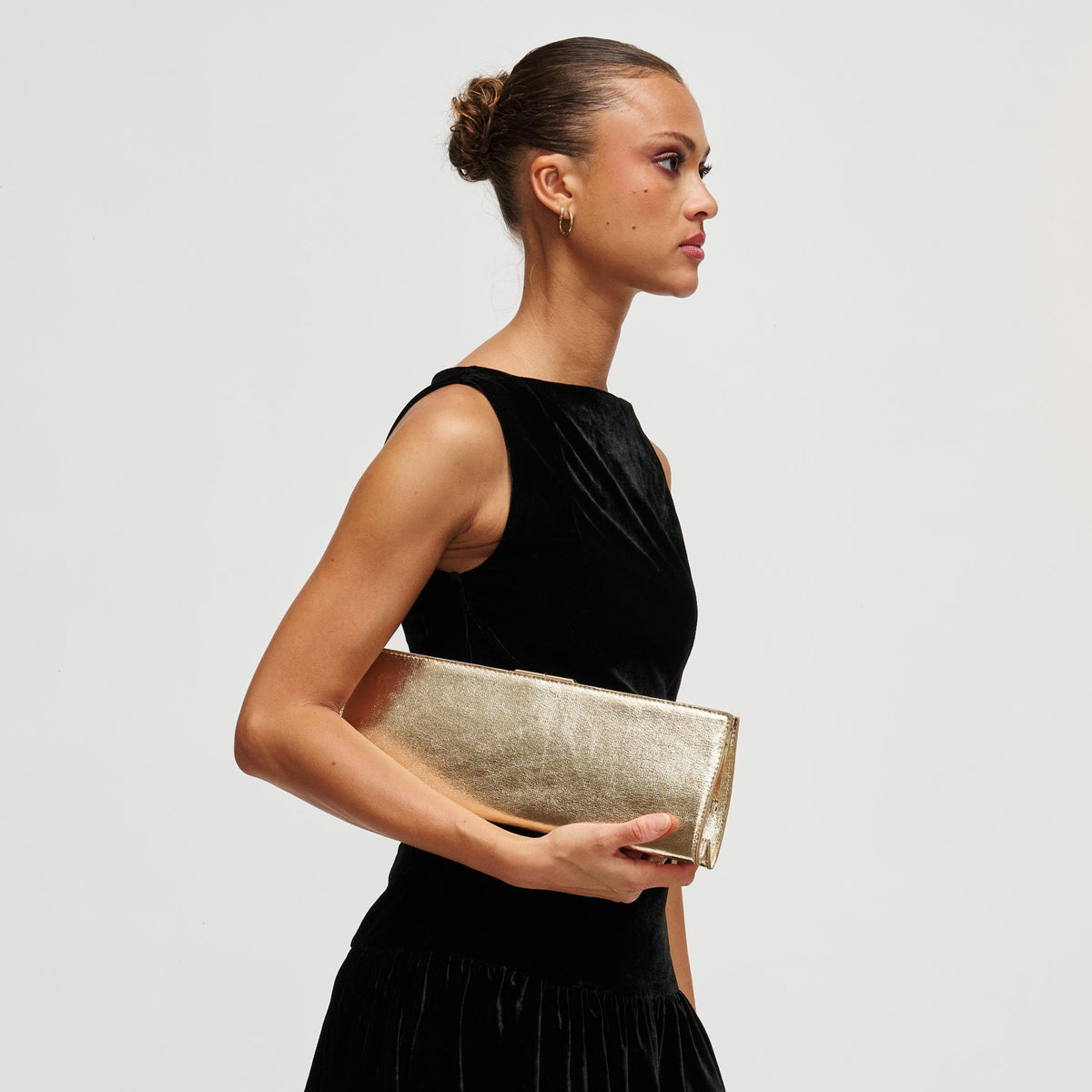 Woman wearing Gold Urban Expressions Nazlee - Met Clutch 840504212666 View 3 | Gold