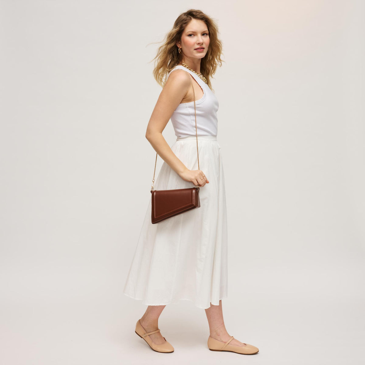 Woman wearing Chocolate Urban Expressions Sleek Contour Crossbody 840504200229 View 4 | Chocolate