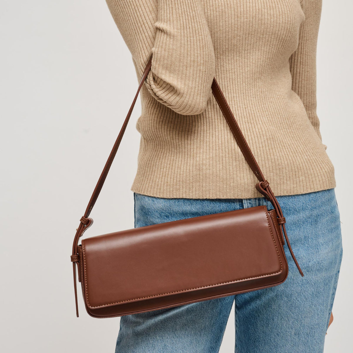 Woman wearing Chocolate Urban Expressions Sorella Shoulder Bag 840611199355 View 1 | Chocolate