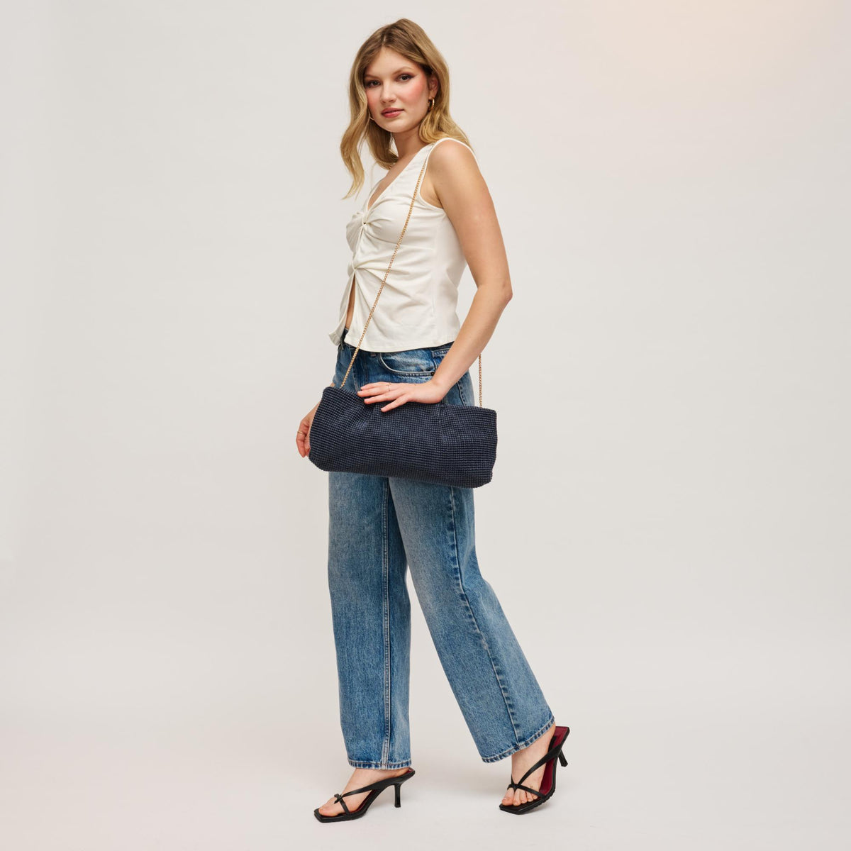 Woman wearing Navy Urban Expressions Franny - Seasonal Clutch 840504203527 View 3 | Navy