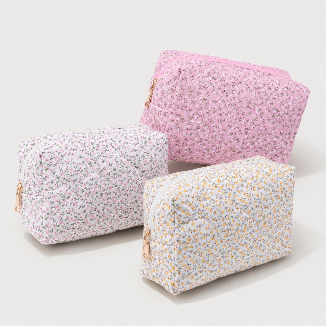 Woman wearing Dusty Rose Floral Urban Essentials Garden Glow Cosmetic & Travel Organizer Pouch 840504209901 View 2 | Dusty Rose Floral