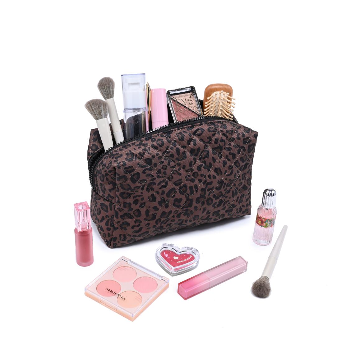 Woman wearing Chocolate Leopard Urban Essentials Safari Chic Cosmetic & Travel Organizer Pouch 840504209819 View 1 | Chocolate Leopard