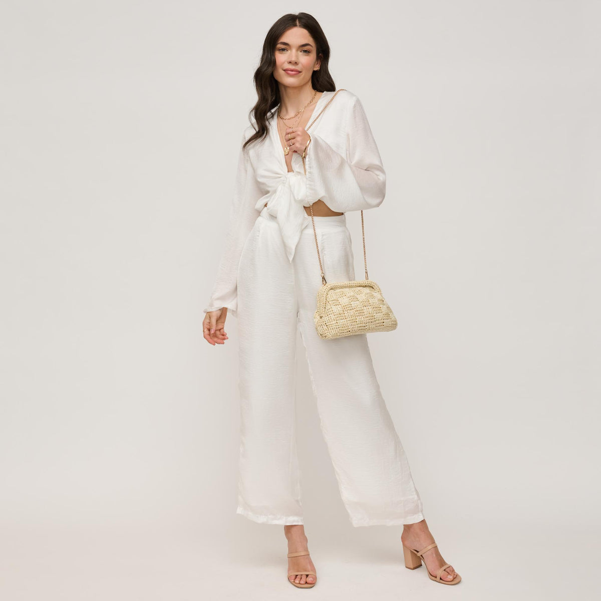 Woman wearing Cream Urban Expressions Annie Clutch 840611146267 View 3 | Cream