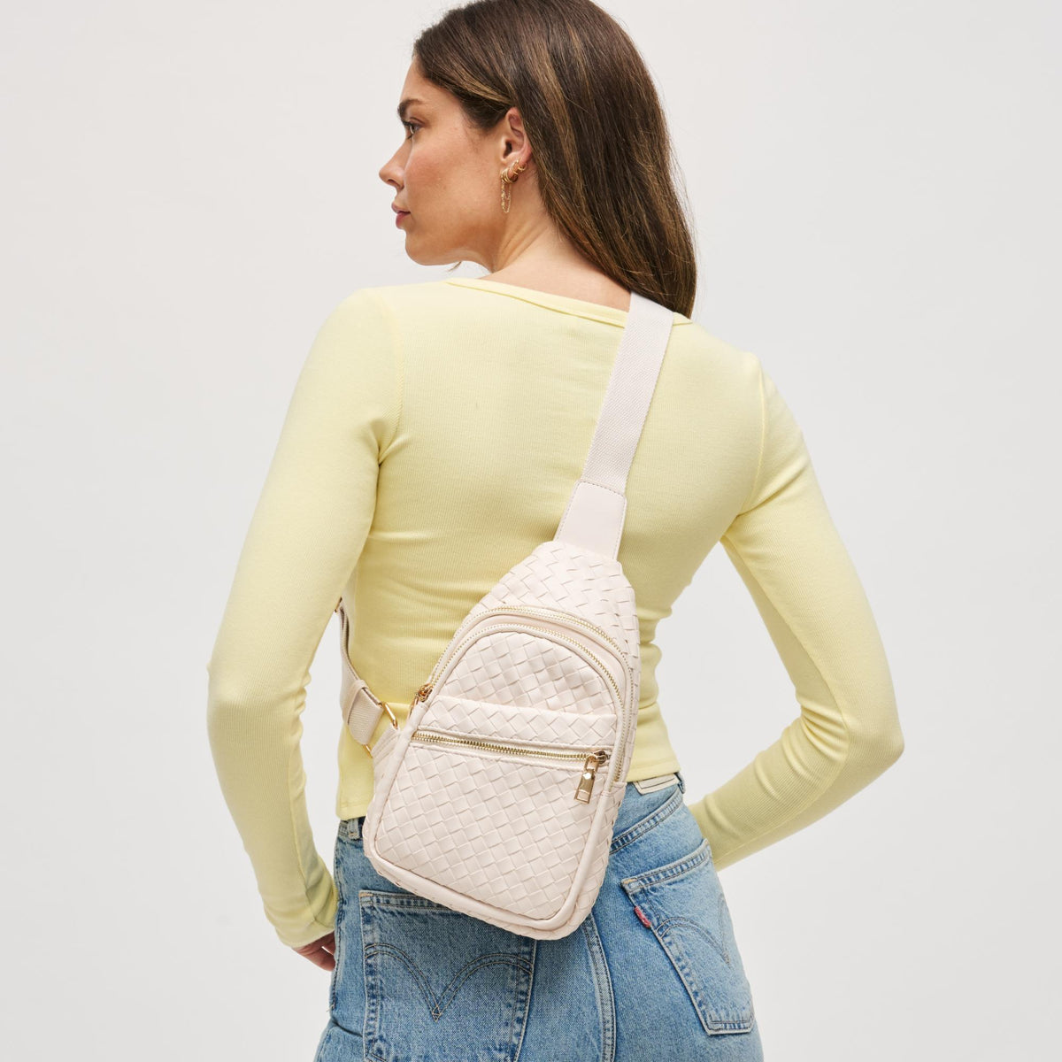 Woman wearing Oatmilk Urban Expressions Zephyr - Woven Sling Backpack 840611194954 View 3 | Oatmilk