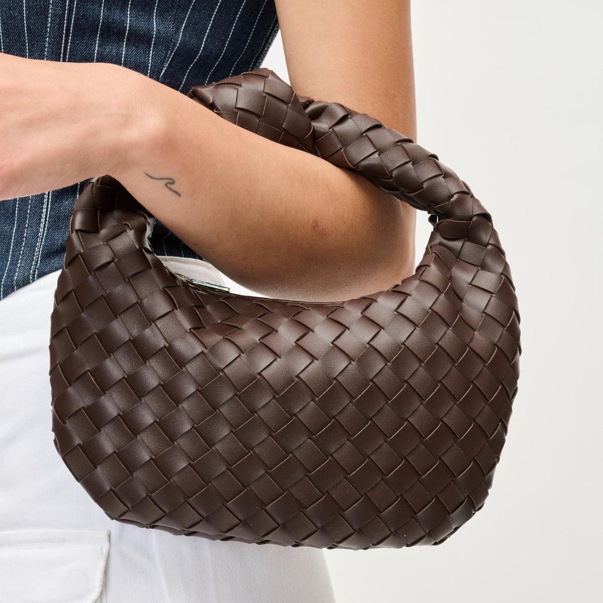 Woman wearing Espresso Urban Expressions Tracy - Woven Clutch 840611192943 View 4 | Espresso