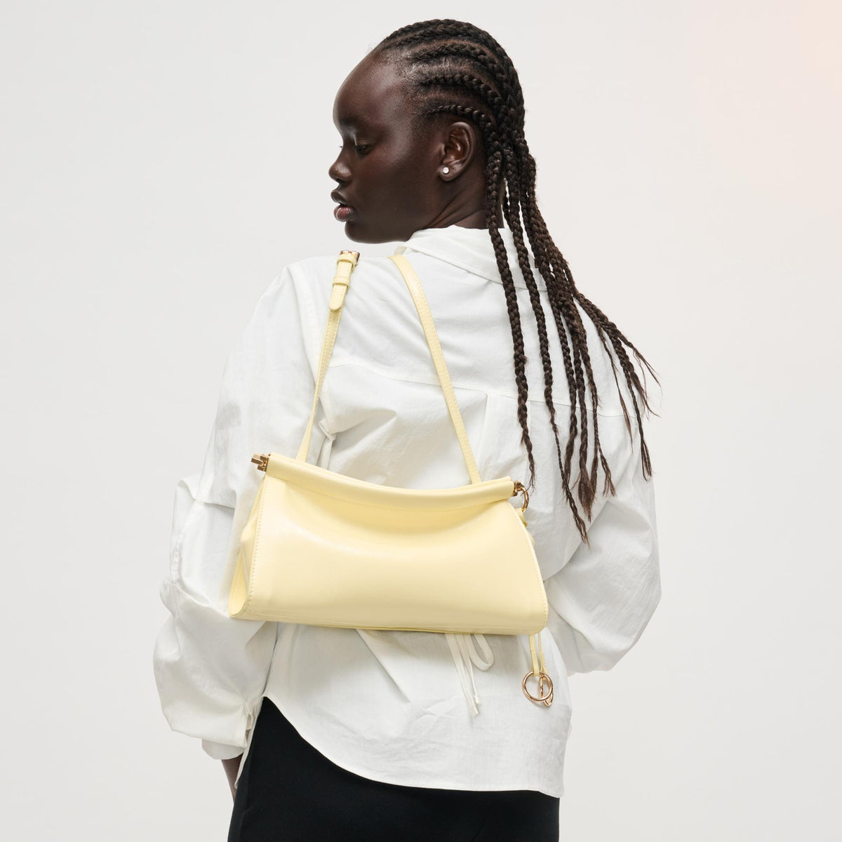 Woman wearing Butter Urban Expressions Elowyn Crossbody 840504208034 View 4 | Butter
