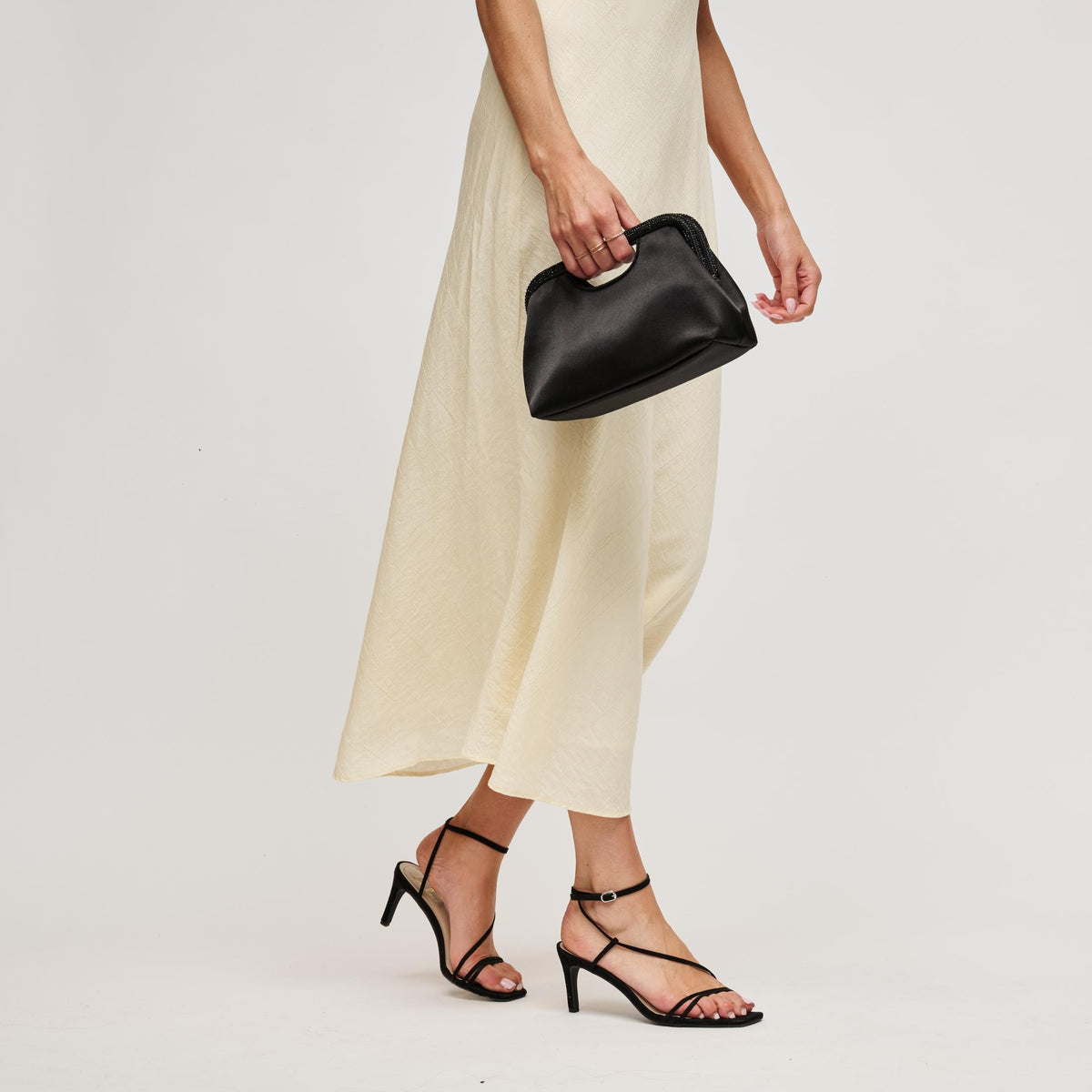 Woman wearing Black Urban Expressions Arthur Clutch 840504212918 View 3 | Black