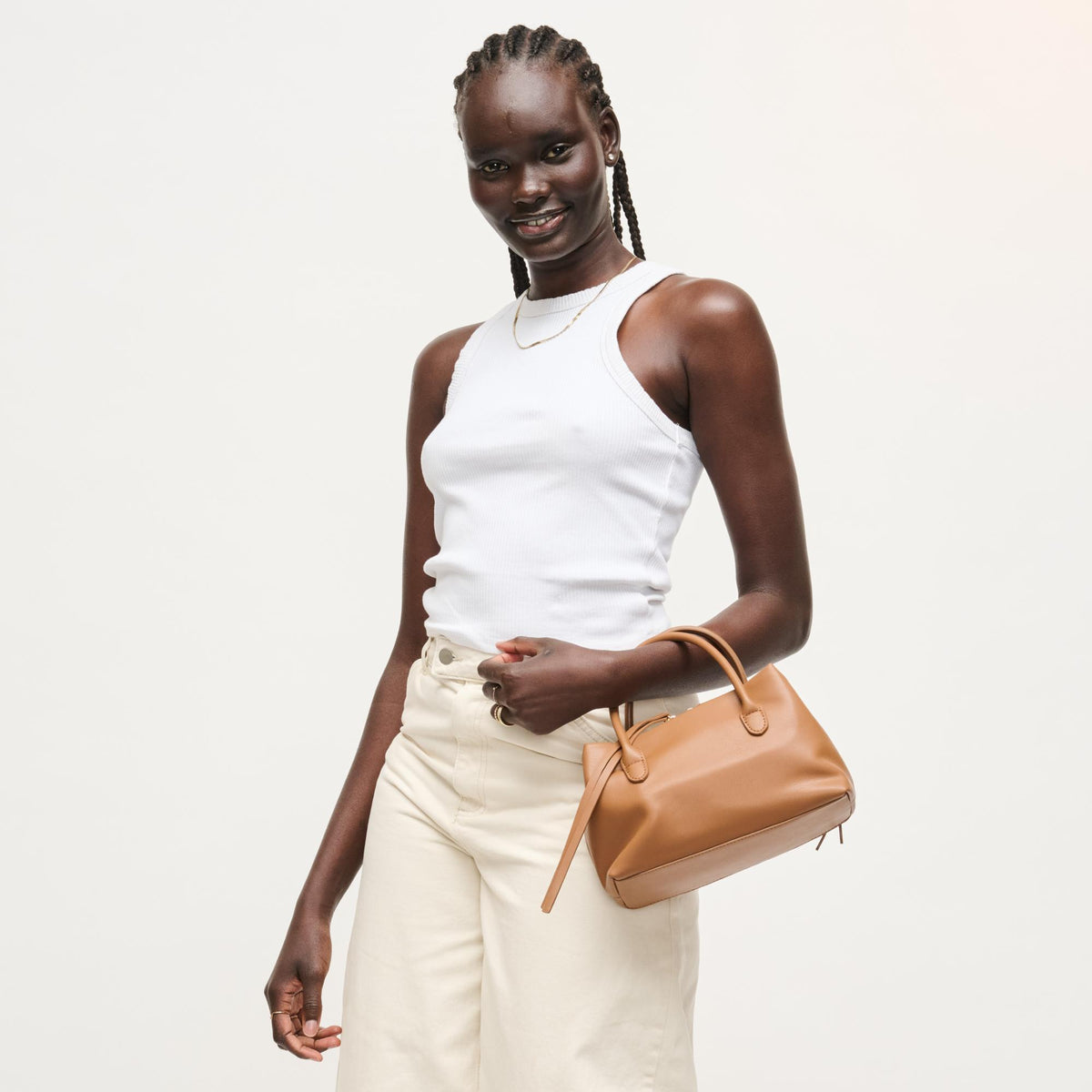 Woman wearing Camel Urban Expressions Logan Crossbody 840504205354 View 4 | Camel