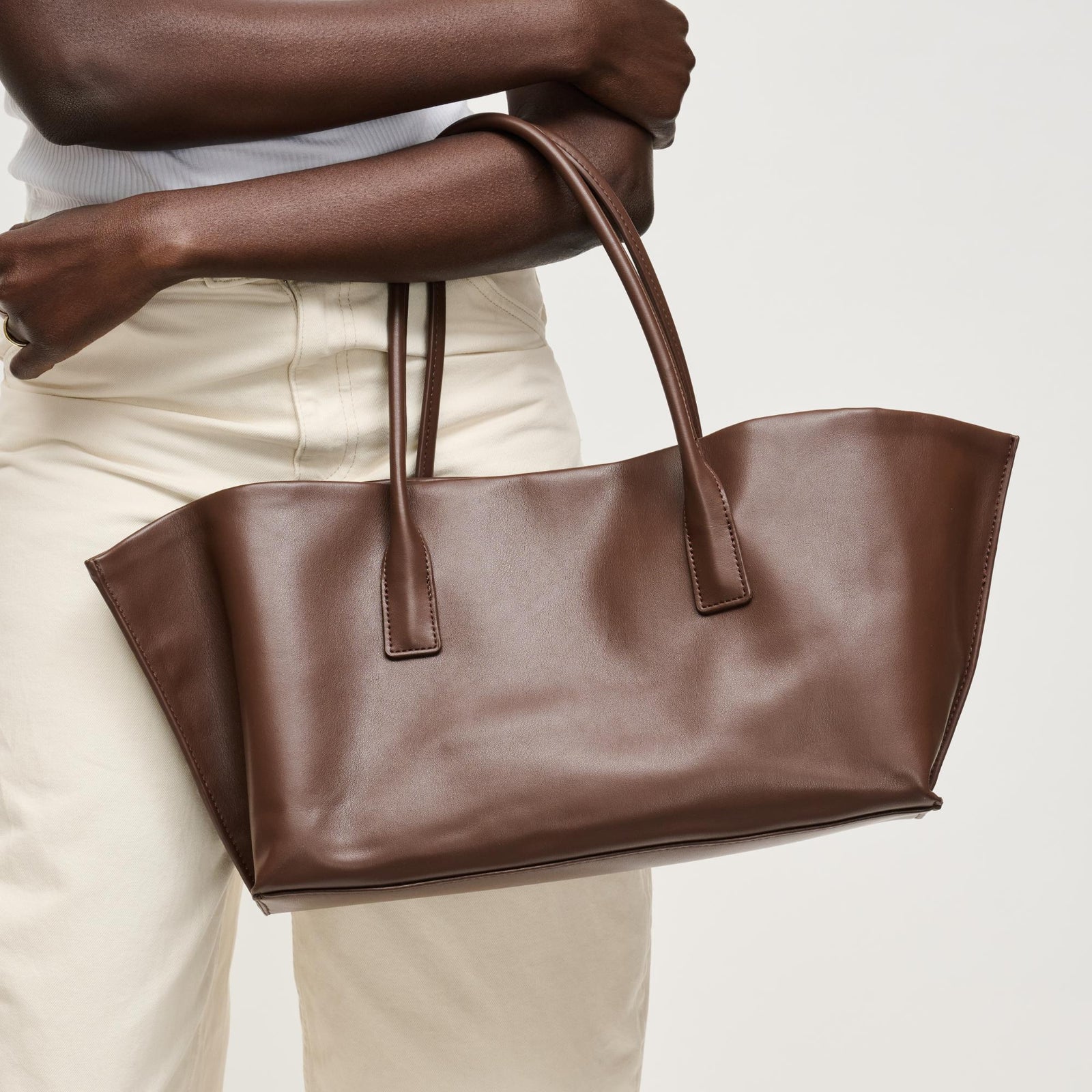 Woman wearing Black Urban Expressions Levi Tote 840504205255 View 1 | Black