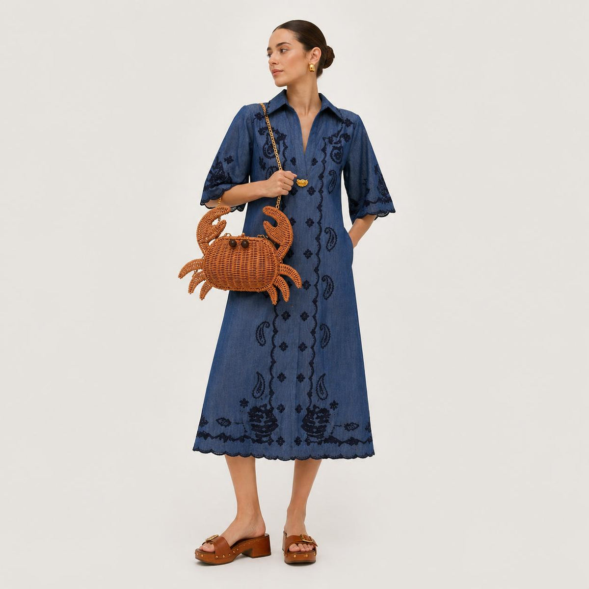 Woman wearing Tan Urban Expressions Sebastian Clutch 840504210242 View 4 | Tan