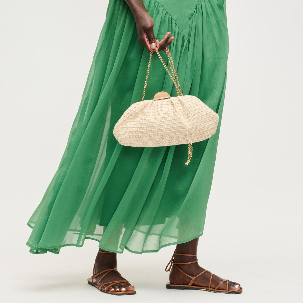 Woman wearing Natural Urban Expressions Dorothea Clutch 840504204302 View 3 | Natural