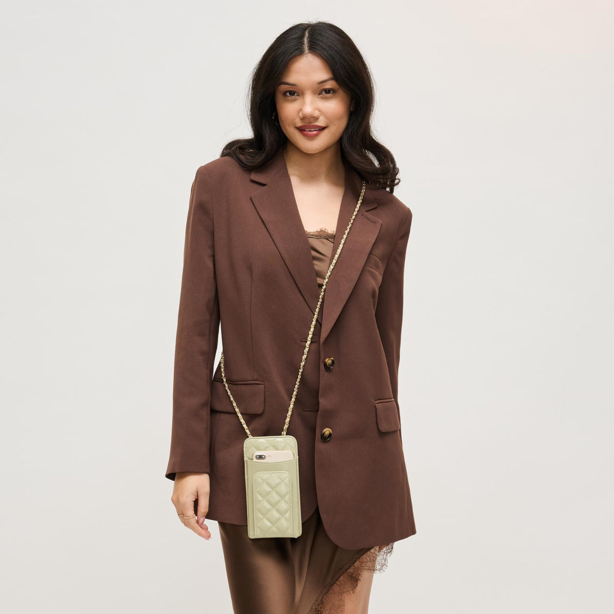 Woman wearing Sage Urban Expressions Brianna 2.0 Cell Phone Crossbody 840504203756 View 1 | Sage