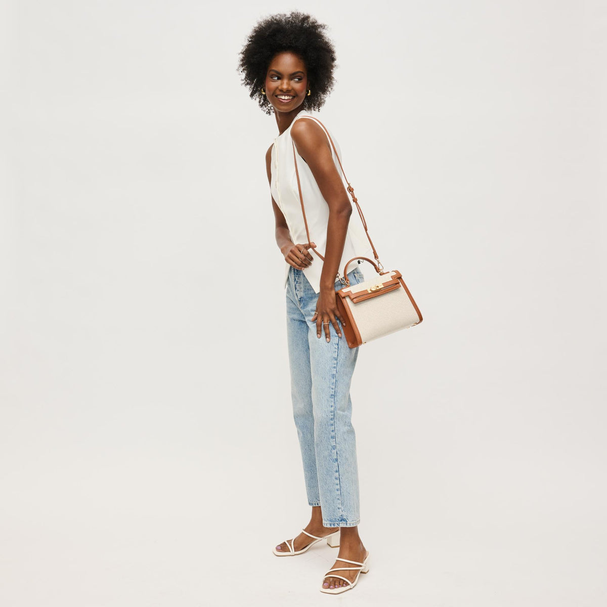 Woman wearing Tan Ivory Urban Expressions Cher Clutch 840611146311 View 4 | Tan Ivory