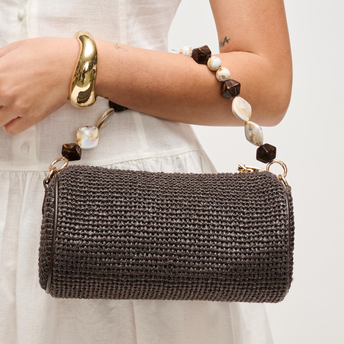 Woman wearing Chocolate Urban Expressions Rachel - Straw Clutch 840504206221 View 4 | Chocolate
