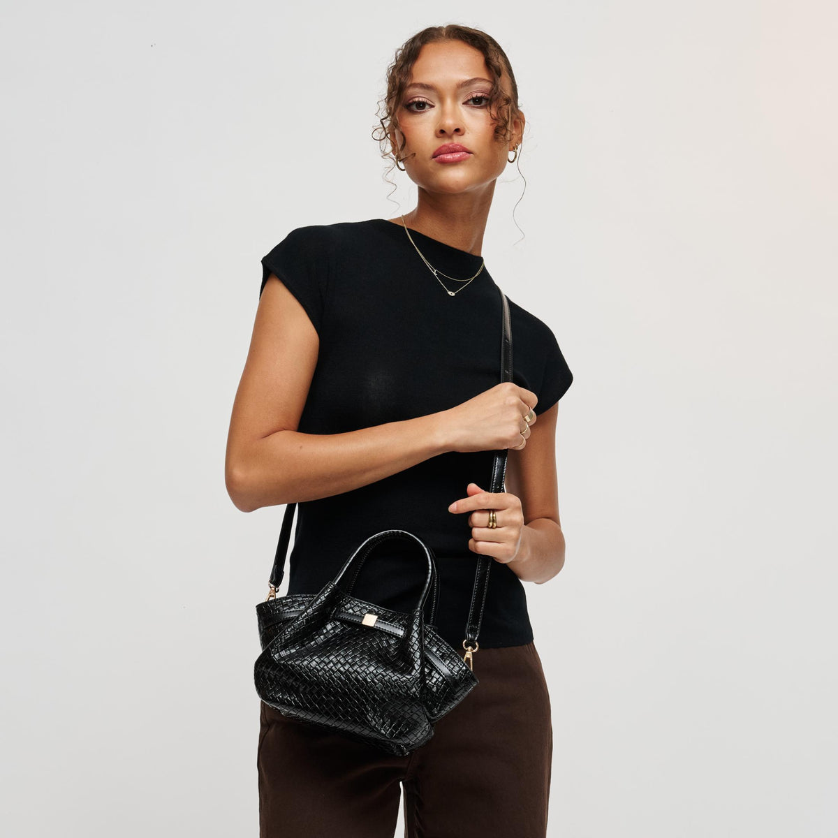 Woman wearing Black Urban Expressions Selena - Embossed Woven Crossbody 840504214080 View 2 | Black