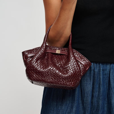 Woman wearing Burgundy Urban Expressions Selena - Embossed Woven Crossbody 840504212147 View 1 | Burgundy