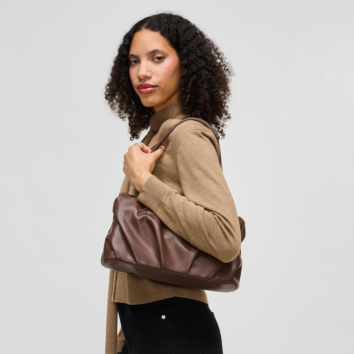 Woman wearing Chocolate Urban Expressions Ryker Satchel 840504213298 View 3 | Chocolate