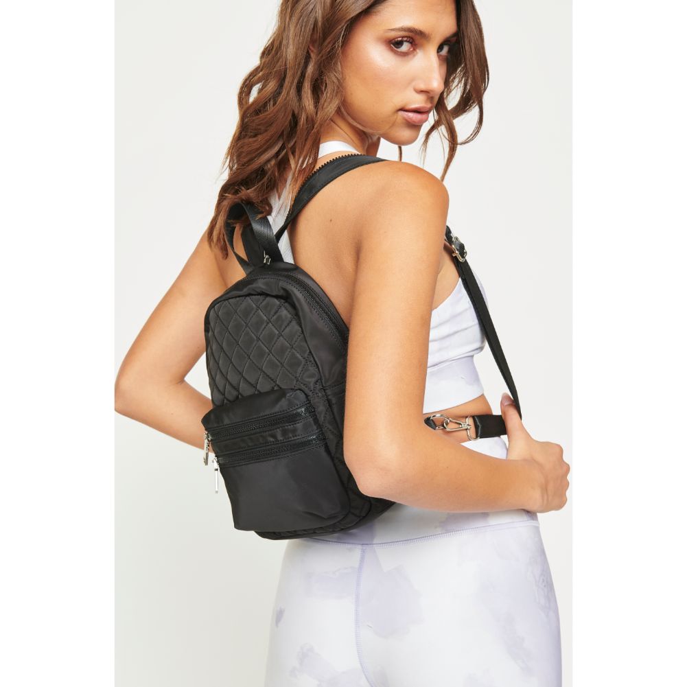 Woman wearing Black Urban Expressions Brynlee Sling Backpack 840611180452 View 4 | Black