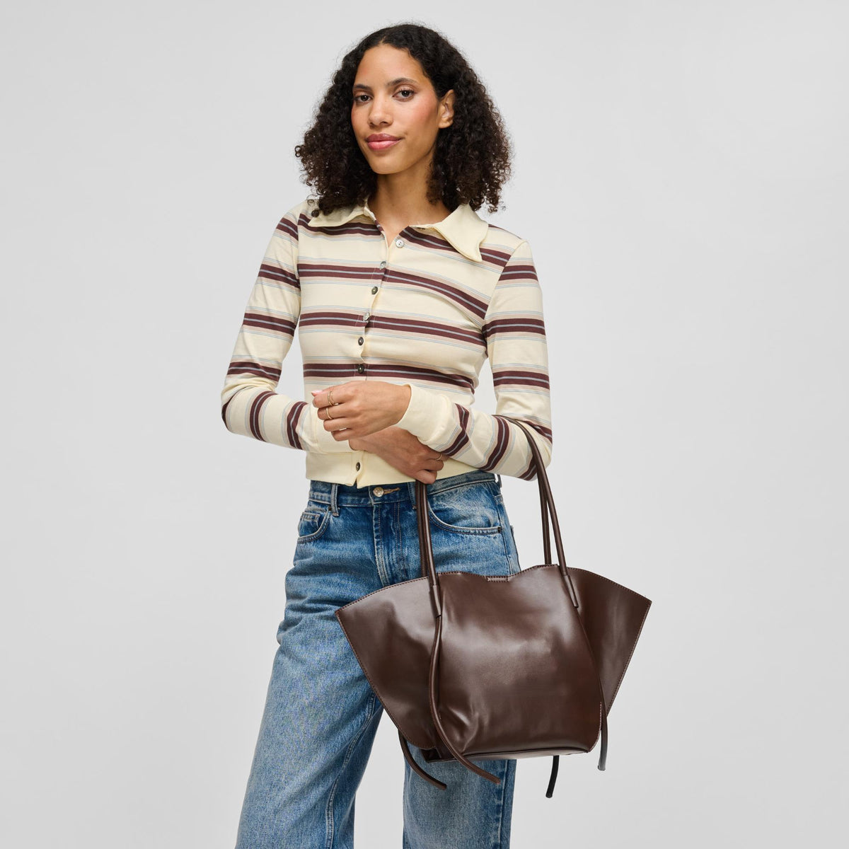 Woman wearing Chocolate Urban Expressions Caspien Tote 840504213267 View 3 | Chocolate