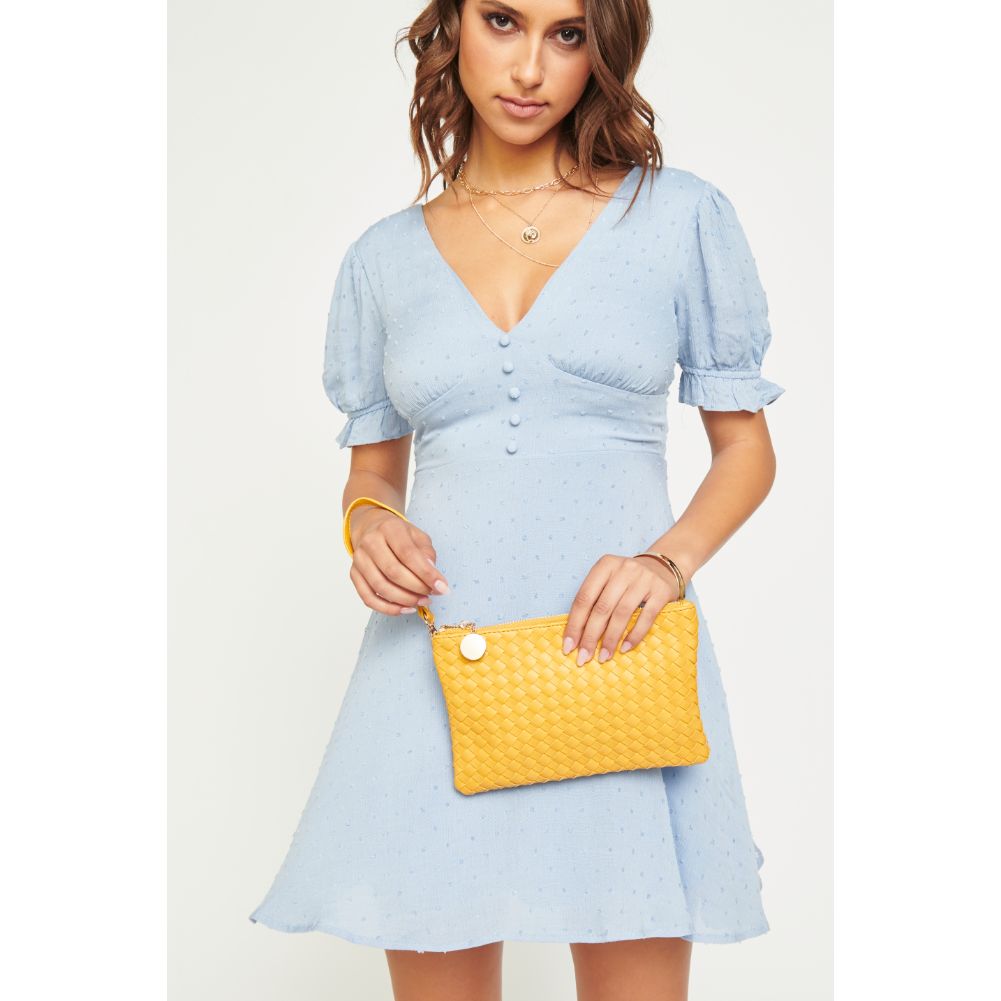 Woman wearing Mustard Urban Expressions Joan Wristlet NA-840611160478 View 4 | Mustard