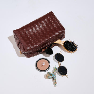Woman wearing Chocolate Urban Essentials Weave & Wander Cosmetic & Travel Organizer Pouch 840611197863 View 1 | Chocolate