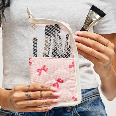 Woman wearing Pink Bow Urban Essentials Makeup MVP Brush Holder 840504201134 View 1 | Pink Bow