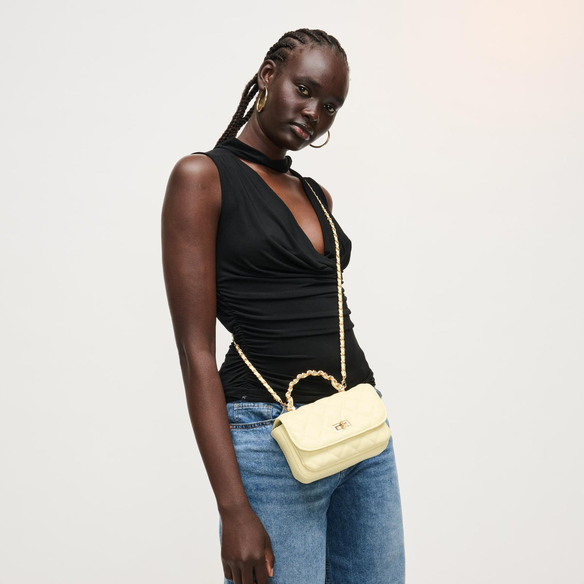 Woman wearing Butter Urban Expressions Leo Crossbody 840504205095 View 1 | Butter