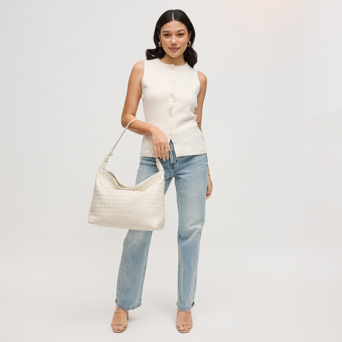 Woman wearing Ivory Urban Expressions Theo Hobo 840504205590 View 4 | Ivory