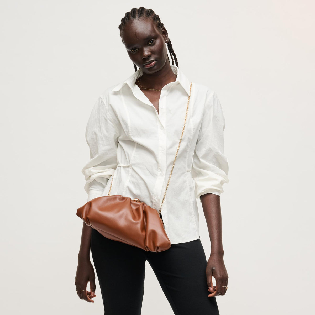 Woman wearing Chocolate Urban Expressions Jennifer Clutch 840504208249 View 3 | Chocolate