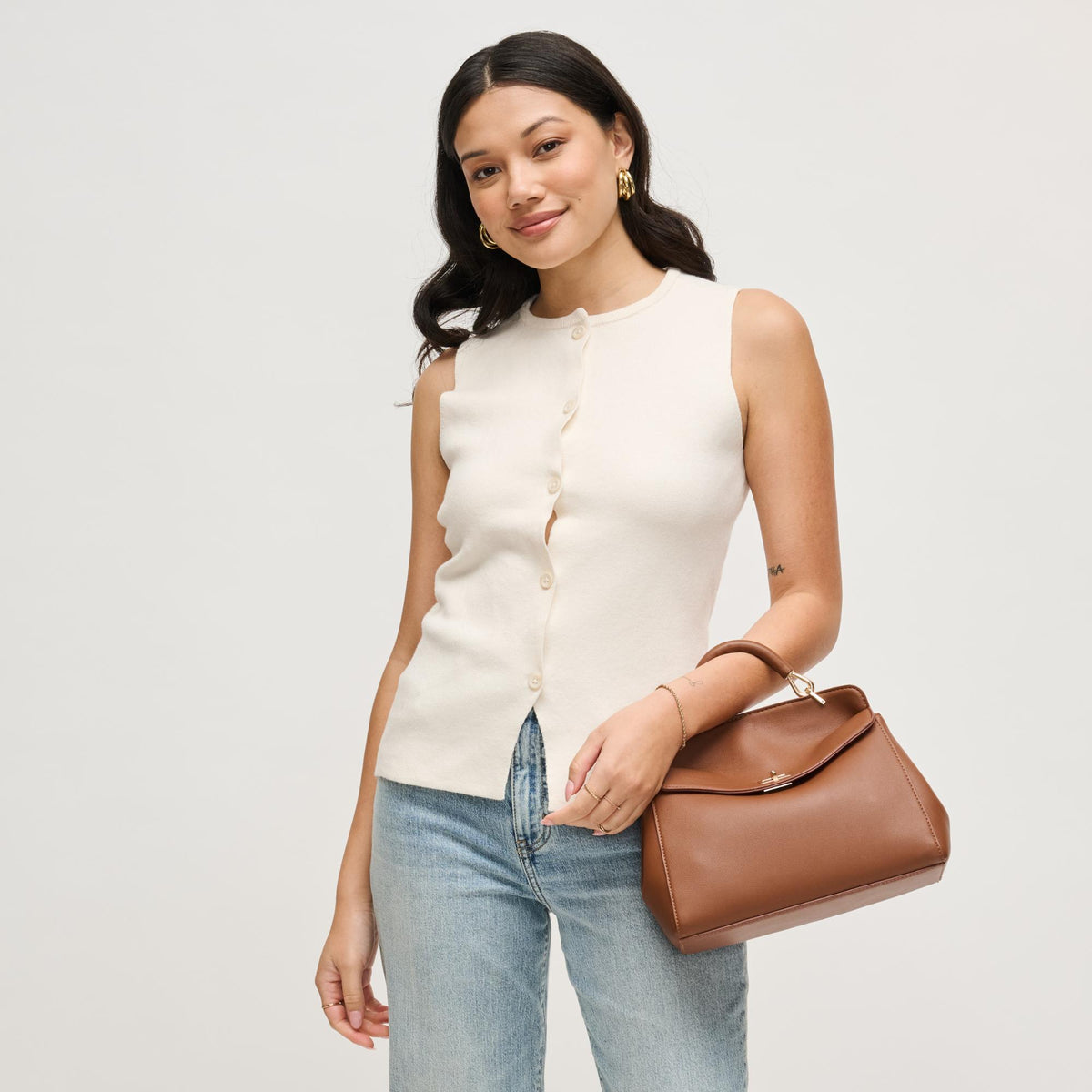 Woman wearing Chocolate Urban Expressions Liza Crossbody 840504208270 View 1 | Chocolate
