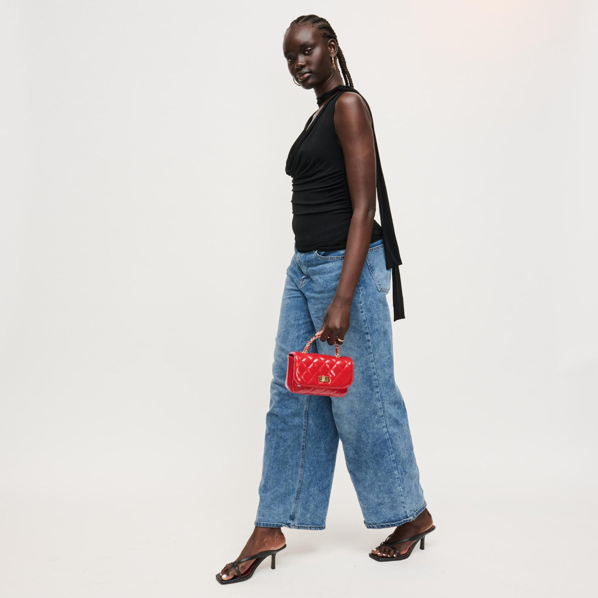 Woman wearing Red Urban Expressions Leo Crossbody 840504205064 View 4 | Red