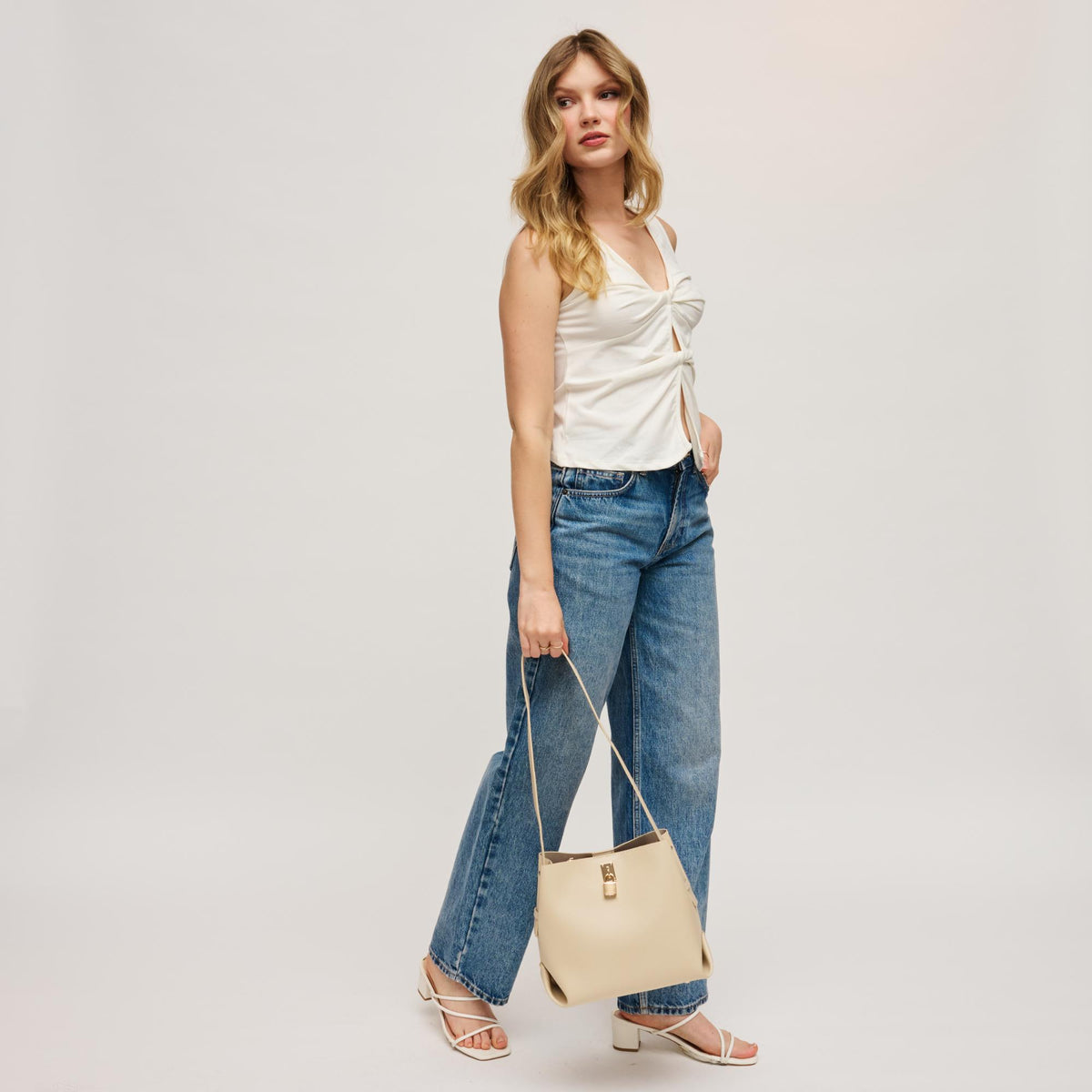 Woman wearing Oatmilk Urban Expressions Mina Crossbody 840504202186 View 4 | Oatmilk