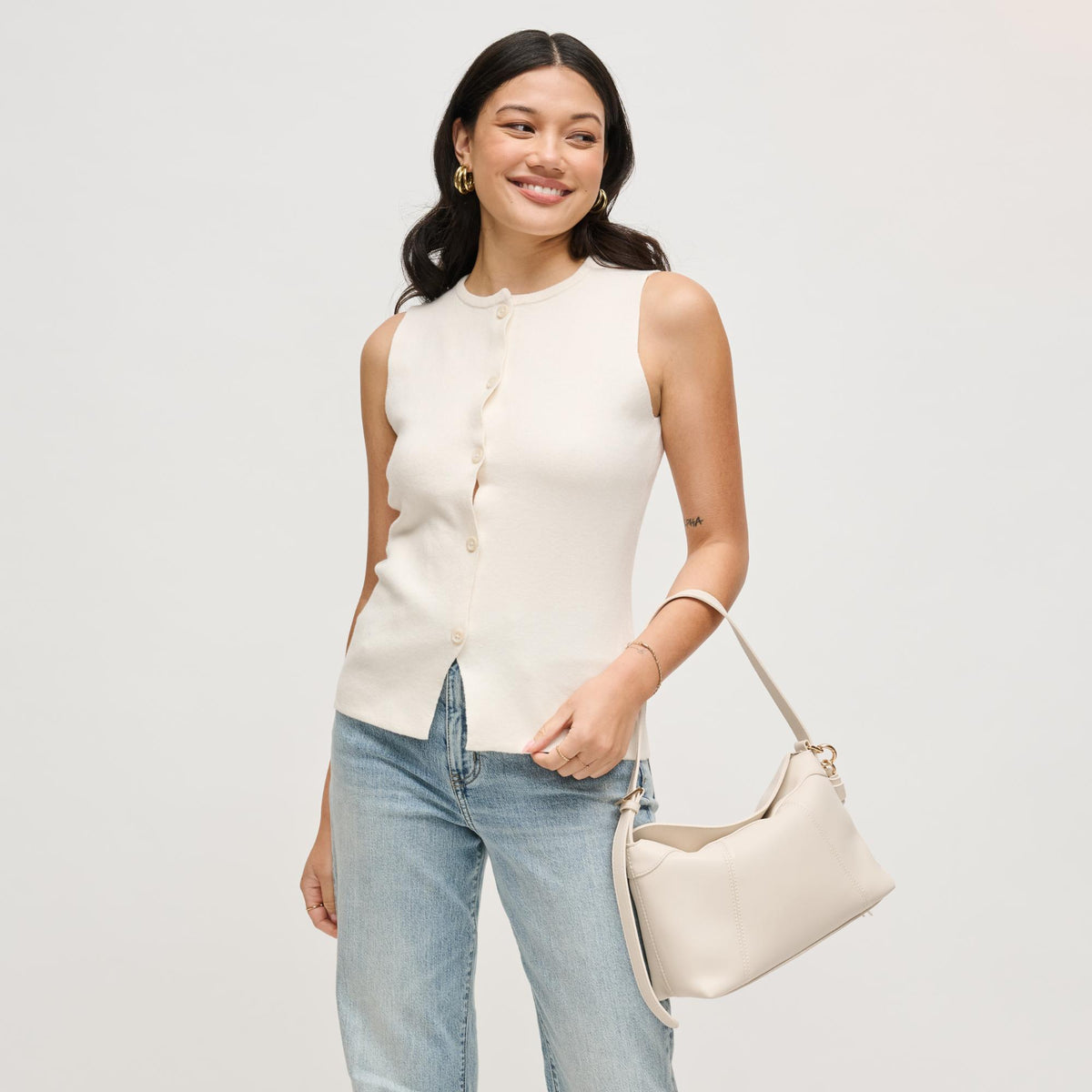 Woman wearing Ivory Urban Expressions Waylon Shoulder Bag 840504205149 View 2 | Ivory
