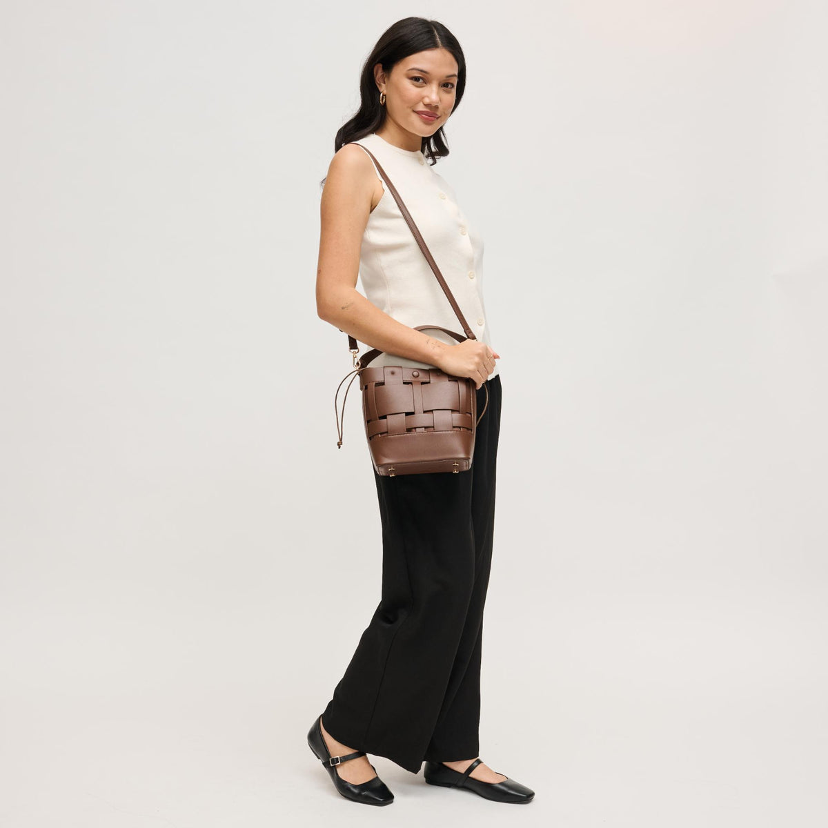 Woman wearing Chocolate Urban Expressions Parker Crossbody 840504205453 View 4 | Chocolate