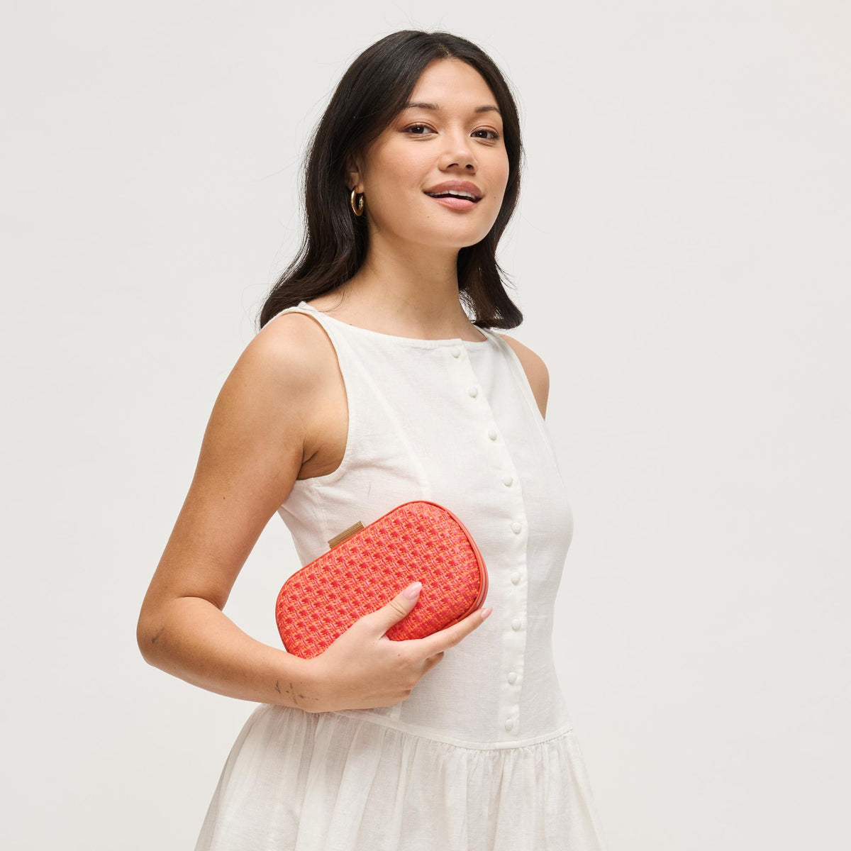 Woman wearing Coral Urban Expressions Cove Evening Bag 840504208324 View 4 | Coral