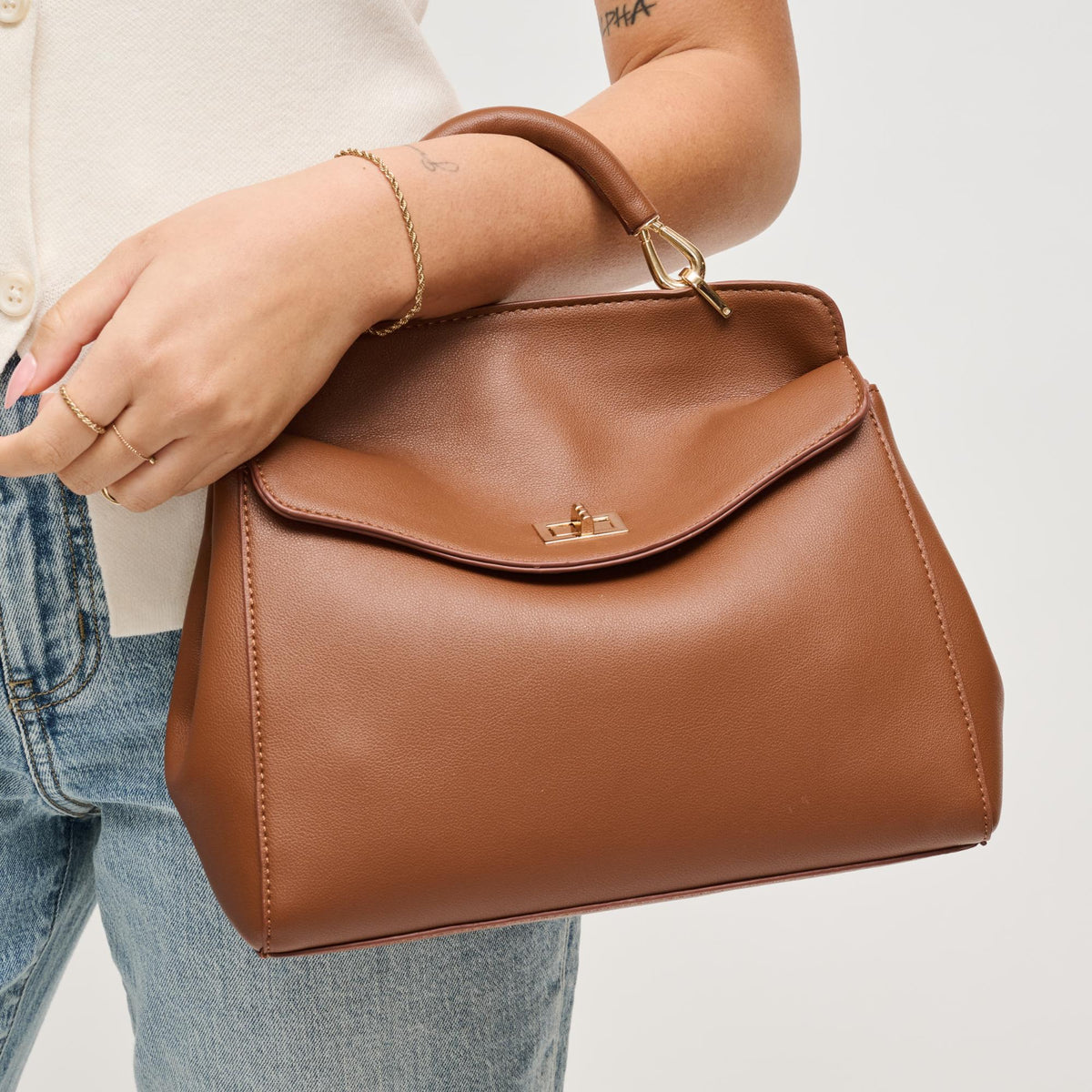 Woman wearing Chocolate Urban Expressions Liza Crossbody 840504208270 View 4 | Chocolate