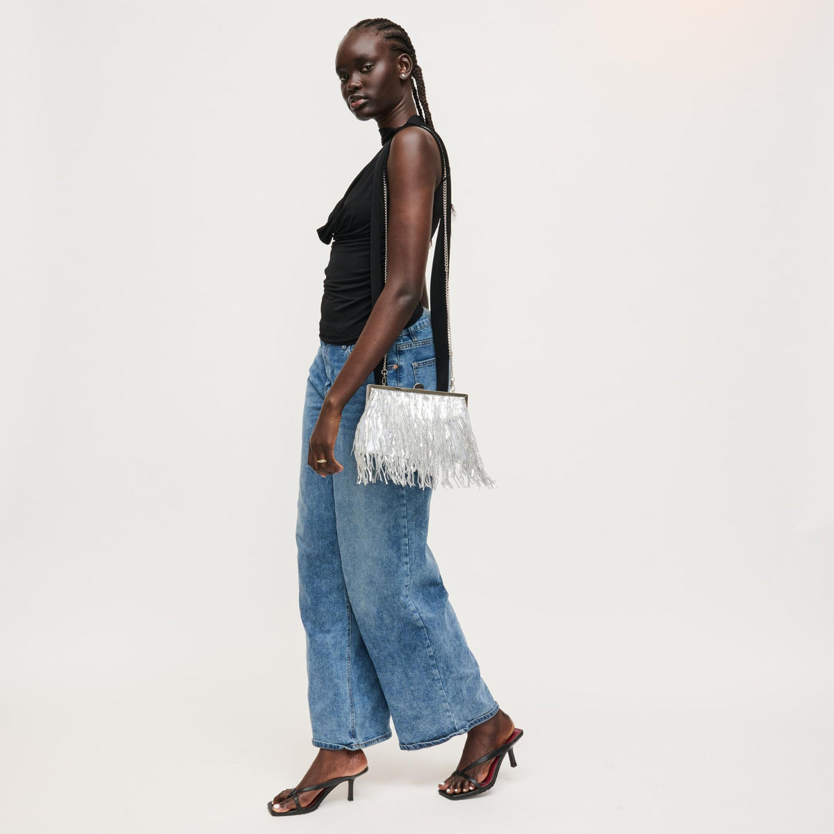 Woman wearing Silver Urban Expressions Celestia Evening Bag 840504206474 View 2 | Silver