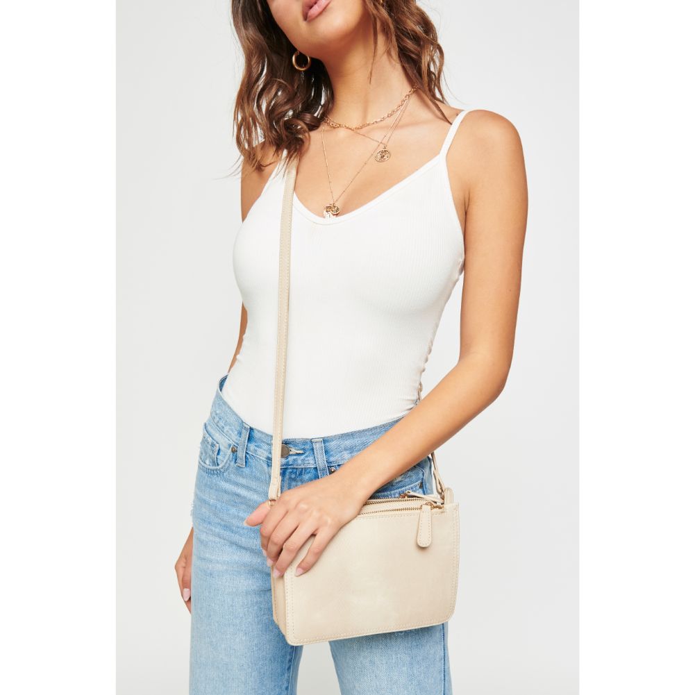 Woman wearing Cream Urban Expressions Rayna Snake Crossbody NA-840611164032 View 1 | Cream