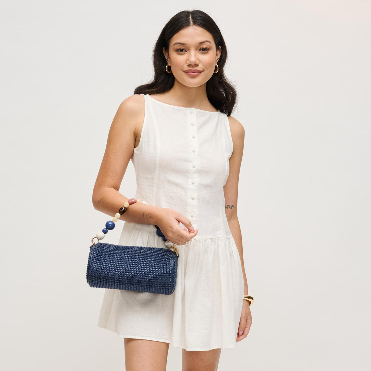 Woman wearing Navy Urban Expressions Rachel - Straw Clutch 840504206245 View 3 | Navy