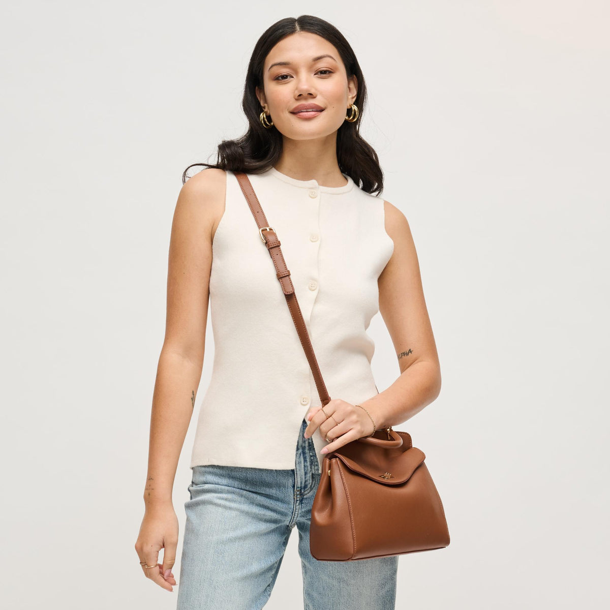 Woman wearing Chocolate Urban Expressions Liza Crossbody 840504208270 View 2 | Chocolate