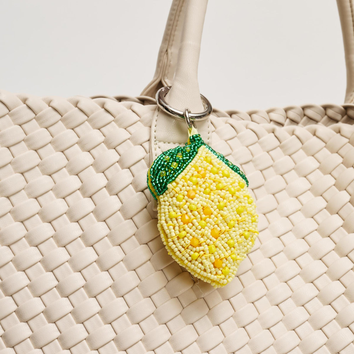 Woman wearing Lemon Urban Expressions Fruity Keychain Charm 840504209192 View 1 | Lemon