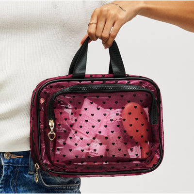 Woman wearing Hot Pink Urban Essentials Kiss & Carry Travel Organizer 840611197870 View 1 | Hot Pink