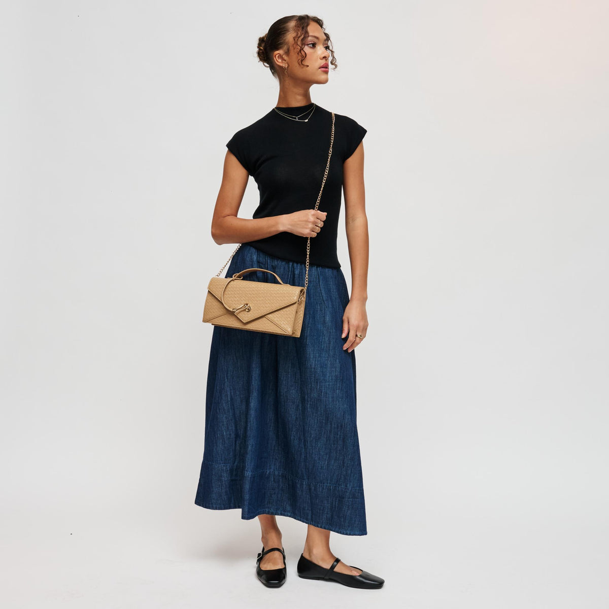 Woman wearing Natural Urban Expressions Khaleesi Clutch 840504211904 View 4 | Natural