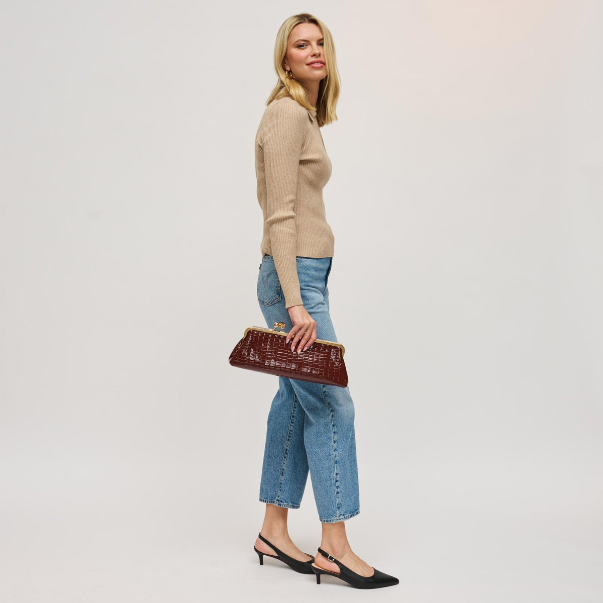 Woman wearing Chocolate Urban Expressions Piper Clutch 840504200731 View 2 | Chocolate