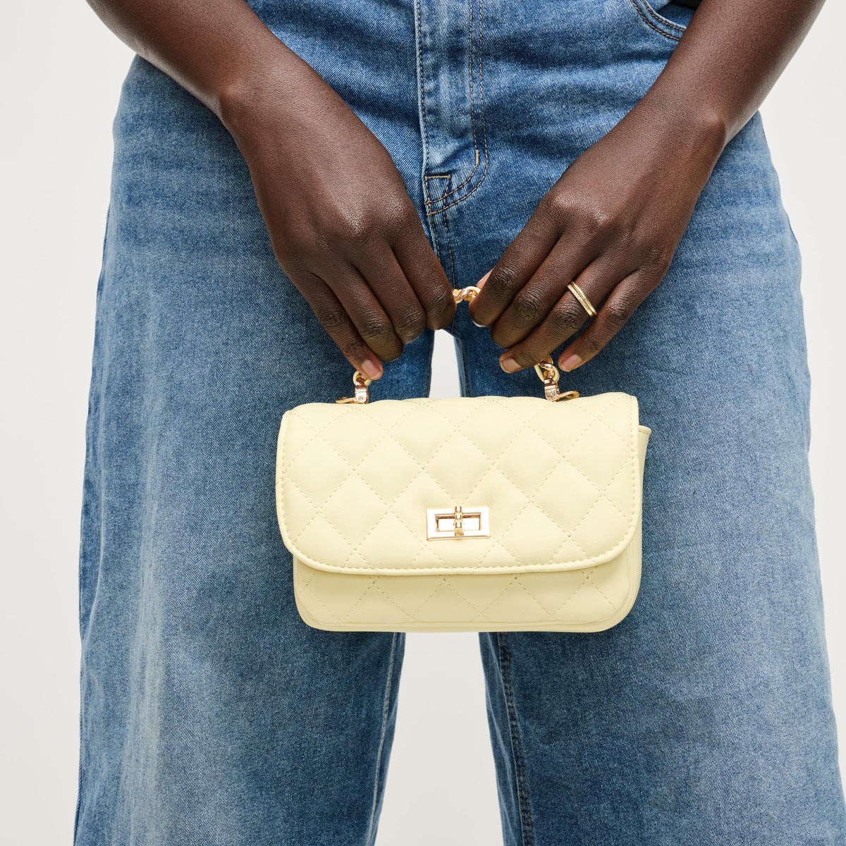 Woman wearing Butter Urban Expressions Leo Crossbody 840504205095 View 3 | Butter