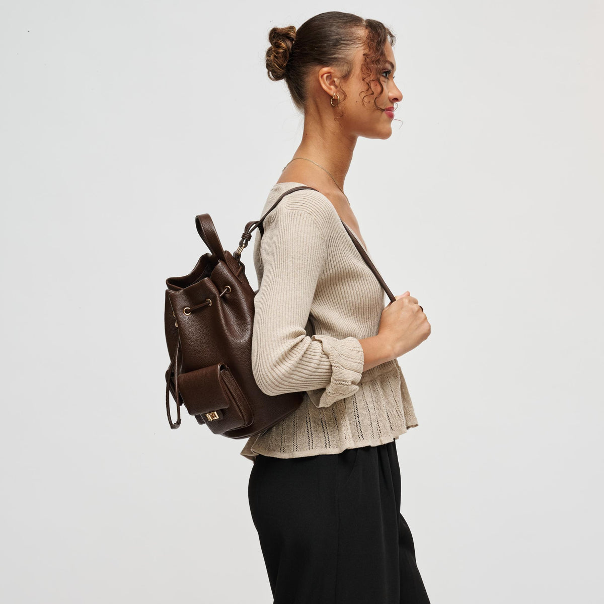 Woman wearing Espresso Urban Expressions Clearfield Backpack 840504212376 View 2 | Espresso