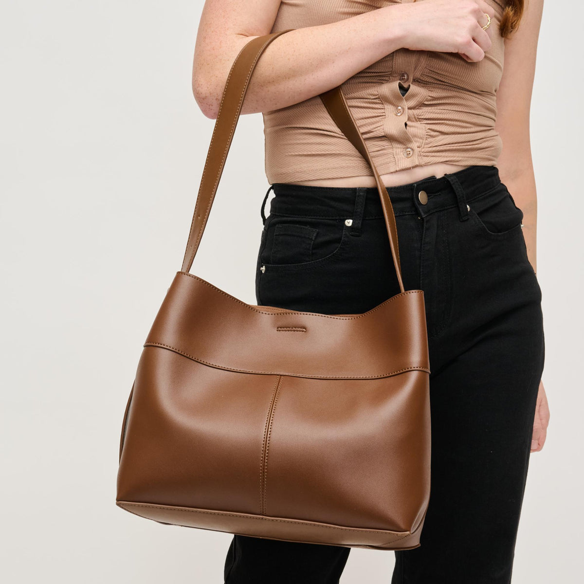 Woman wearing Chocolate Urban Expressions Rory Tote 840611152879 View 1 | Chocolate