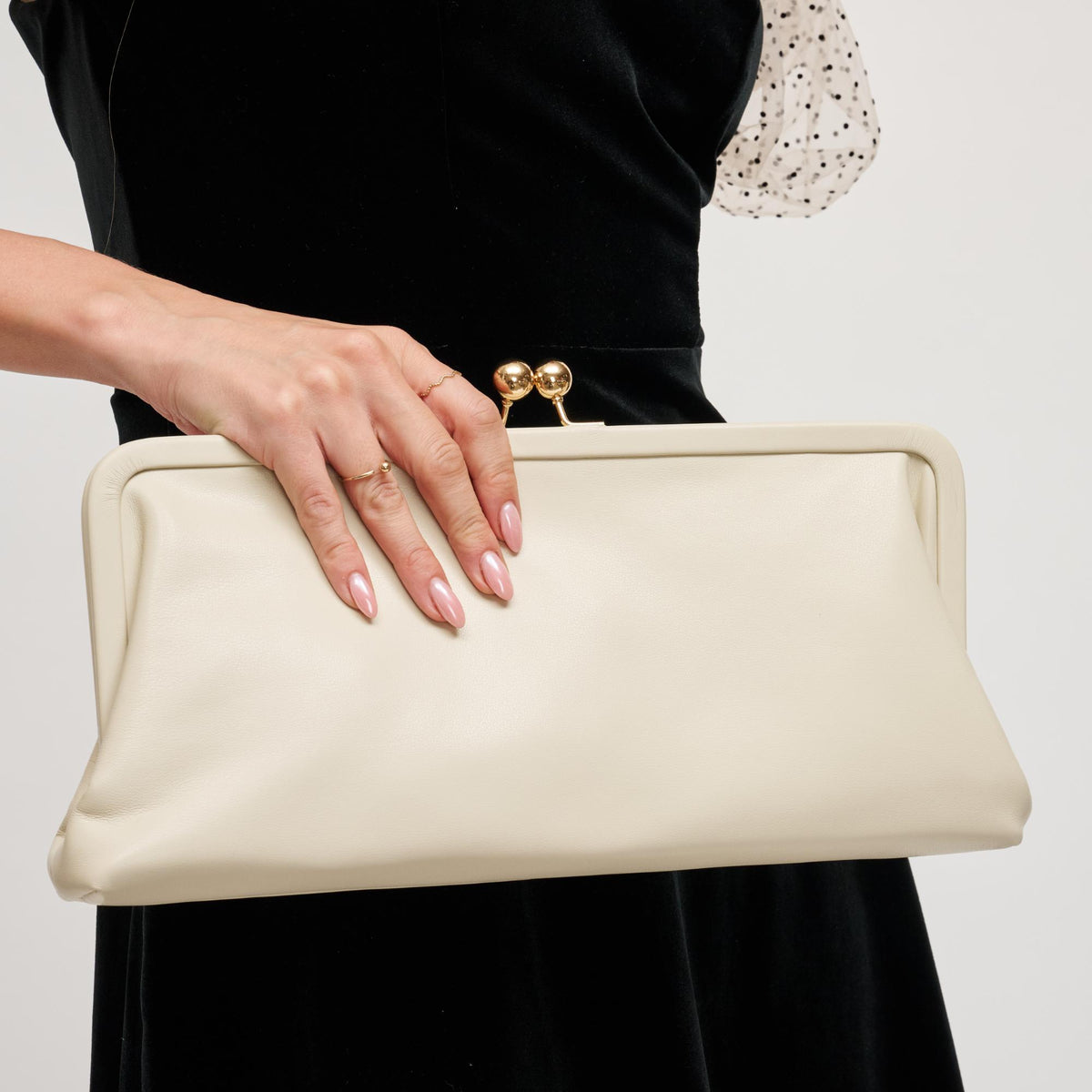 Woman wearing Oatmilk Urban Expressions Kristin Clutch 840611198440 View 4 | Oatmilk