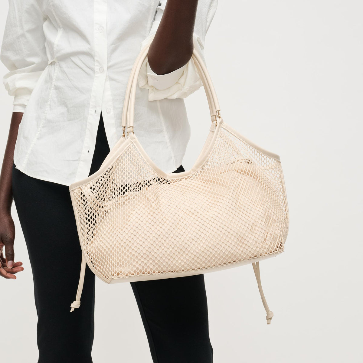 Woman wearing Ivory Urban Expressions Easton Tote 840504205194 View 1 | Ivory